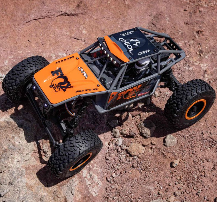 Axial UTB18 Capra 4WD 1/18 RTR – Modèle Orange – ponts portiques, châssis tubulaire – batterie Smart G2 & chargeur inclus – AXI01002V2 – Dernier modèle, discontinué – Univers RcLoisirs