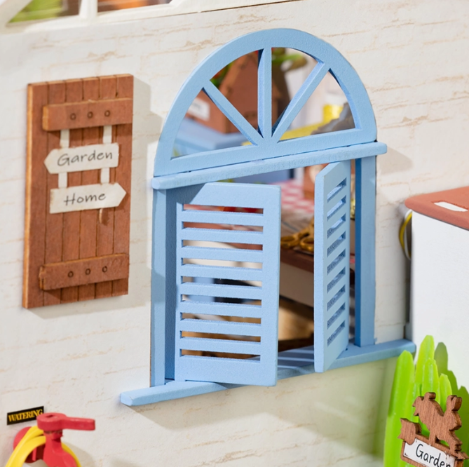 Assemblez la Rolife DG163 – Maison de jardin de rêve. Kit miniature détaillé avec LED, ambiance florale et décor authentique. Univers RcLoisirs.