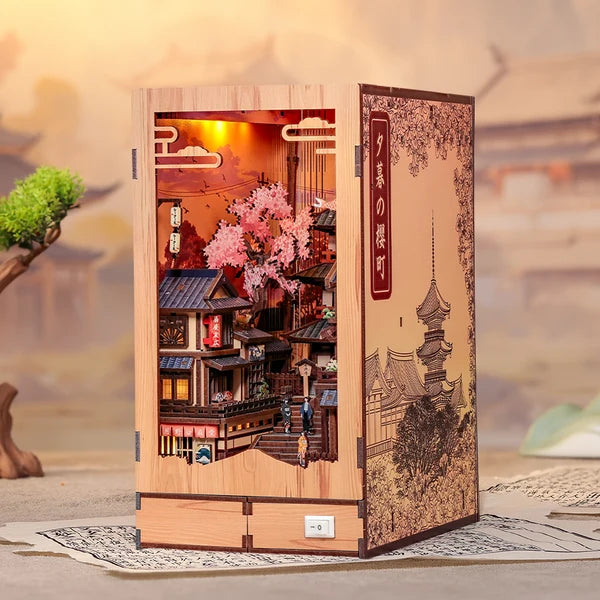 BJAA402 Twilight Sakura Path, Book Nook DIY de 407 pieces inspire des rues de Kyoto avec cerisiers en fleurs, eclairage DEL et decor japonais detaille.