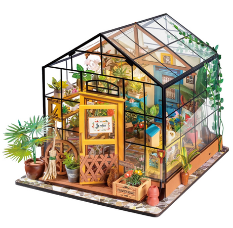 Assemblez la Rolife DG104 – Maison Fleurie de Cathy. Kit miniature détaillé avec LED, serre florale réaliste et ambiance romantique. Univers RcLoisirs.