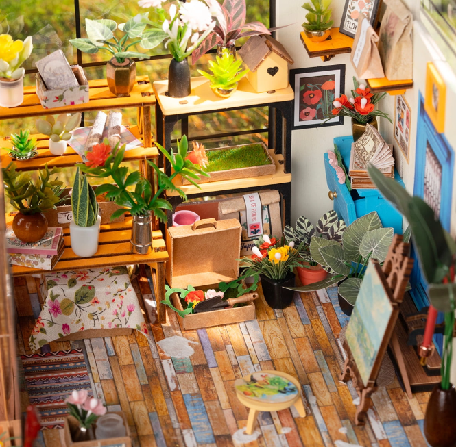 Assemblez la Rolife DG104 – Maison Fleurie de Cathy. Kit miniature détaillé avec LED, serre florale réaliste et ambiance romantique. Univers RcLoisirs.