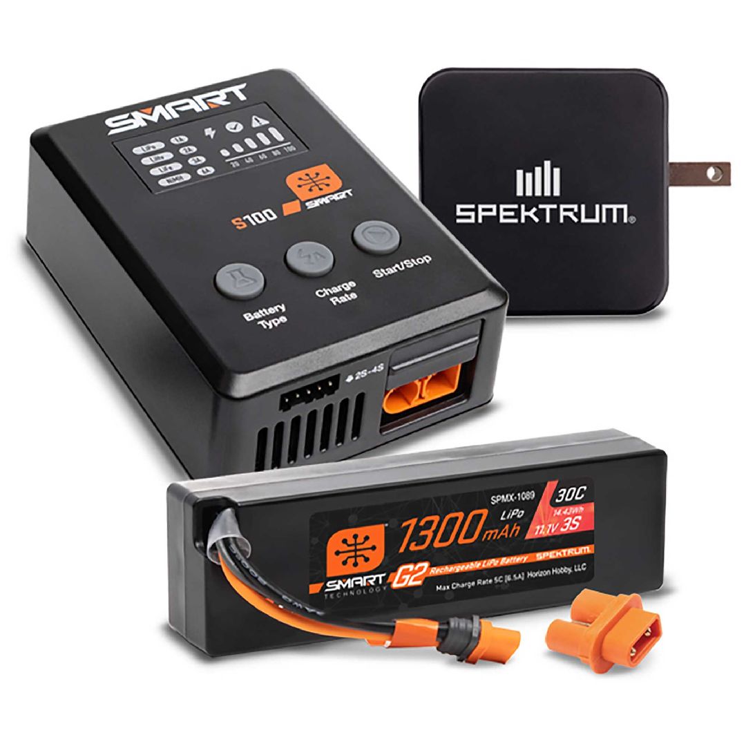 SPMXPSS315 ensemble Spektrum Smart PowerStage comprenant une batterie Smart G2 LiPo 1300 mAh 3S 30C IC2, un chargeur Smart S100 USB-C, une alimentation 65 W et un adaptateur. Idéal pour les véhicules ARRMA GROM BLX.