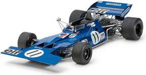 Maquette Tamiya Tyrrell 003 Jackie Stewart 1971 Monaco GP échelle 1/12 – Big Scale Series. Monoplace F1 historique reproduite avec détails précis : nez en T, moteur Ford-Cosworth DFV, suspension à ressorts hélicoïdaux, cockpit réaliste, pneus en caoutchouc, pièces photo-découpées et décalcomanies Cartograf incluses. Maquette plastique injectée pour modélisme automobile de compétition, collection Grand Prix Tamiya.