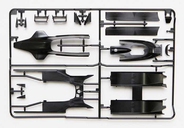 Maquette Tamiya Lotus Type 79 1978 échelle 1/20 – F1 Grand Prix, monoplace John Player Special à assembler en plastique injecté. Modèle détaillé avec livrée noire, effet de sol, cockpit fidèle, moteur reproduit, suspension réaliste, pneus en caoutchouc et décalcomanies incluses. Maquette de compétition inspirée de la voiture pilotée par Mario Andretti et conçue par Colin Chapman pour la collection Grand Prix Tamiya.