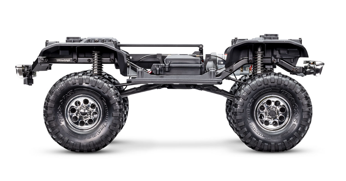 Traxxas TRX-4 Chevrolet K5 Blazer 1972 High Trail 1/10 4WD RTR avec carrosserie clipless, châssis échelle acier, Long Arm Lift, essieux portiques, transmission 2 vitesses et différentiels verrouillables. Véhicule radiocommandé XL-5 HV, moteur Titan 550 21T, suspension GTS pour performance tout-terrain et crawl technique. Idéal pour le modélisme RC, le franchissement, l’exploration extérieure, la conduite hors route et les rassemblements de passionnés RC scale. Convient aux passionnés de plein air, aux clubs