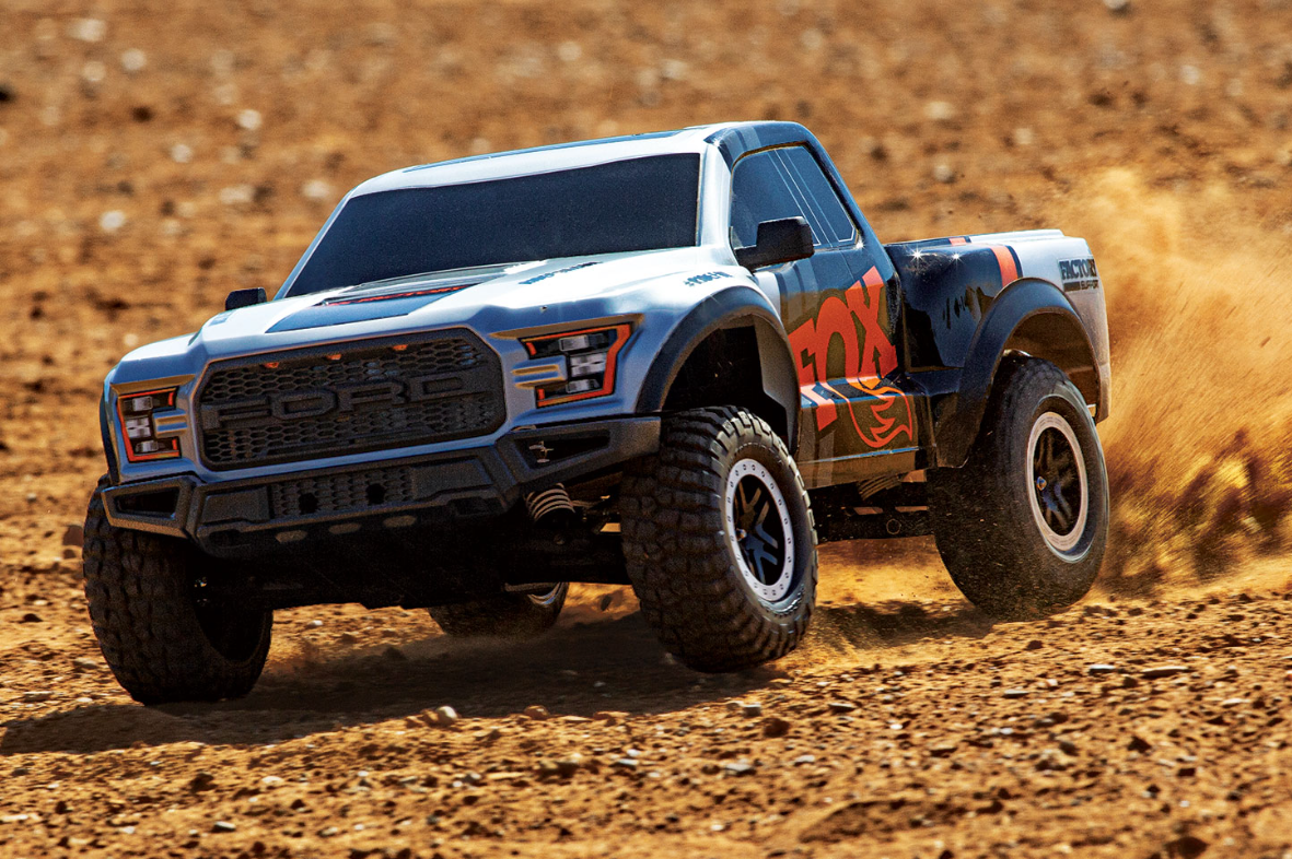 Ford, F-150, Raptor, Traxxas, Short Course, 2WD, BL-2s, RTR, camion, radiocommandé, électrique, LiPo, brosse, monster, truck, véhicule, tout-terrain, RC, échelle, robuste, rapide, puissant, course, piste, hors-route, prêt-à-rouler, suspension, châssis, pneus, adhérence, sport, modélisme, hobby, collection, performance, vitesse, contrôle, maniabilité, moteur, électronique, waterproof, loisirs, passion, pilotage, course RC, camion RC, modèle réduit, terrain accidenté, stabilité, design, Ford officiel, édition