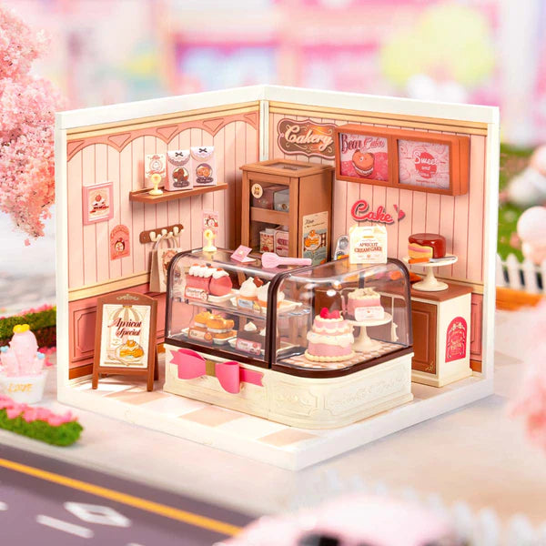 Rolife DW019B « Tasty Cake Shop » – miniature à assembler (Super Creator). Taille montée env. 16,3×16,3×15,2 cm. Kit pâtisserie détaillé, montage rapide et déco créative.
